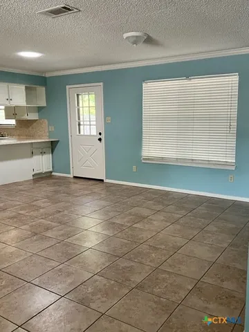 a view of kitchen and window