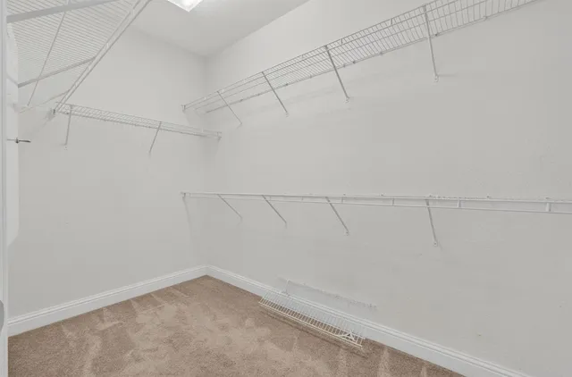 a view of a room with racks on the wall