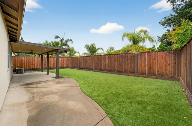 a view of a backyard with a garden