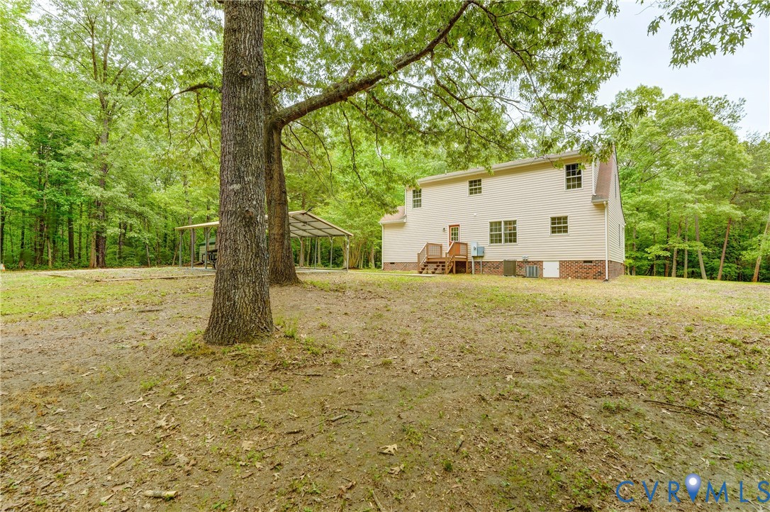 3820 Mt Pleasant Road Providence Forge, VA 23140 - Photo 36 of 40 a view of a house with backyard and tree