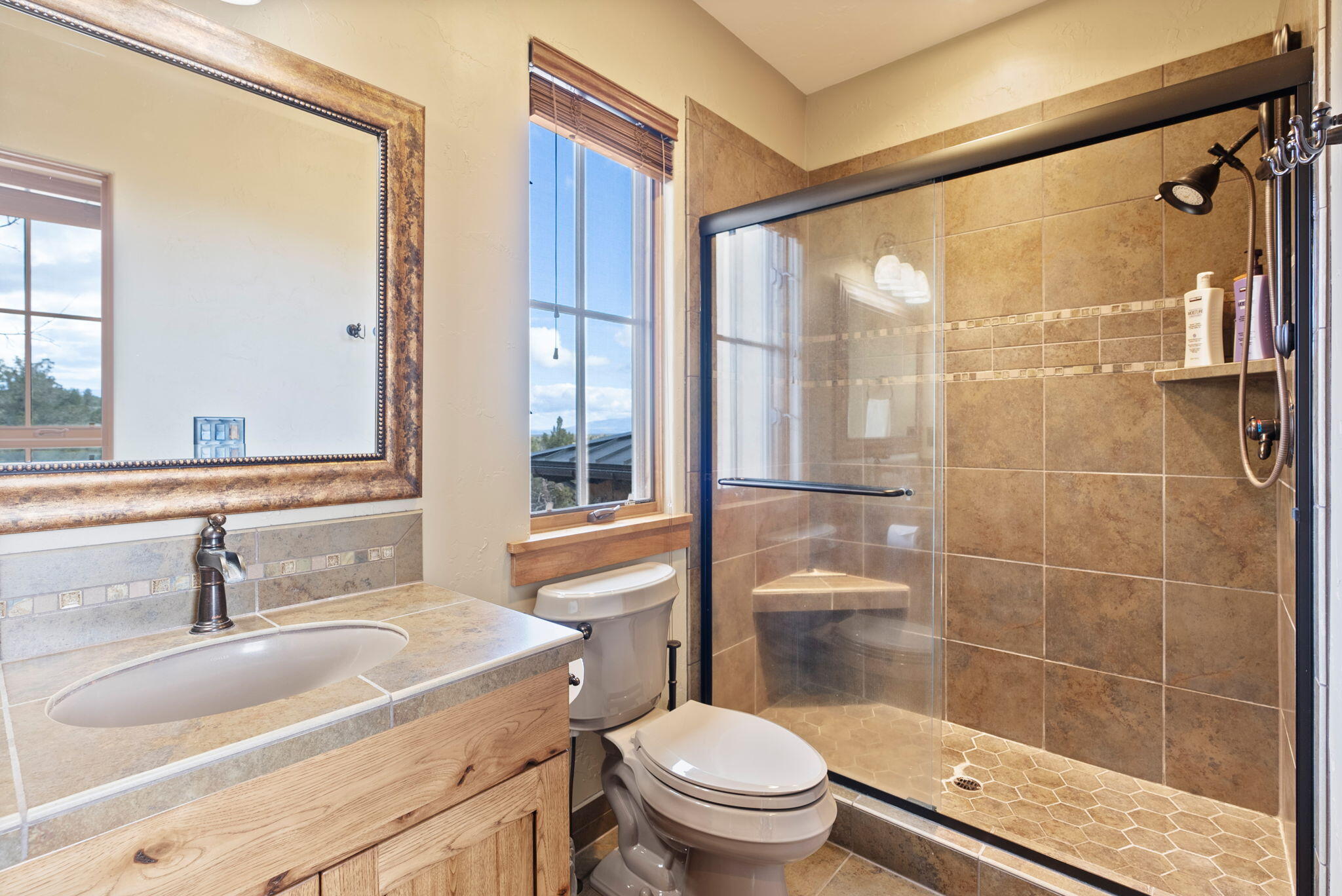 22887 Ghost Tree Lane Bend, OR 97701 - Photo 73 of 97 Luxurious guest suite bath with full tile, walk-in shower.