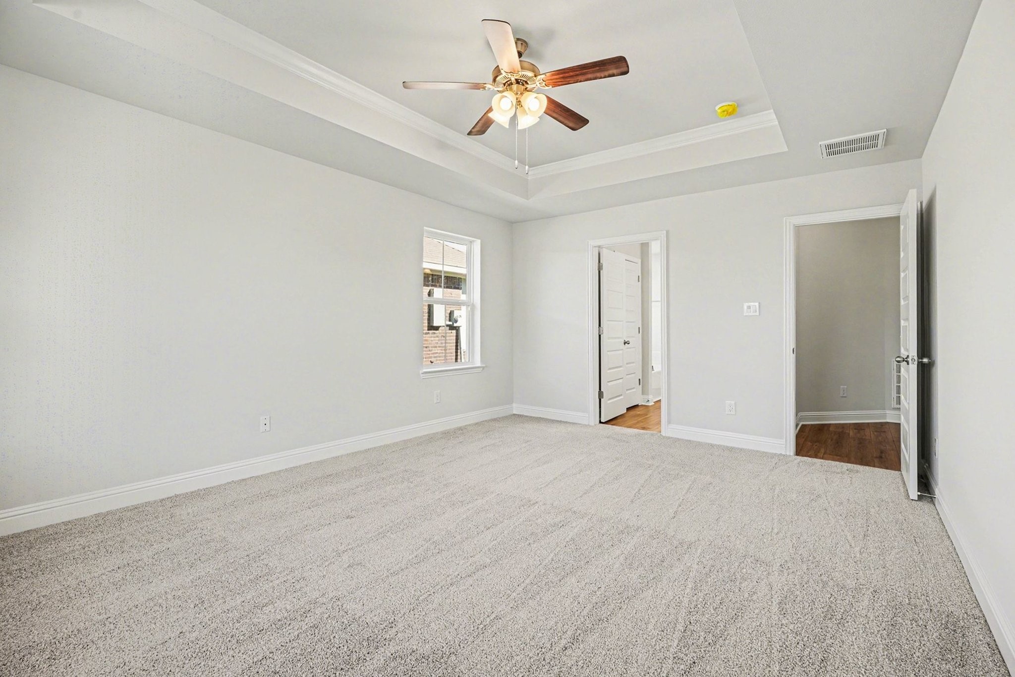 5 Keystone Court Angleton, TX 77515 - Photo 23 of 33 a view of an empty room with a window