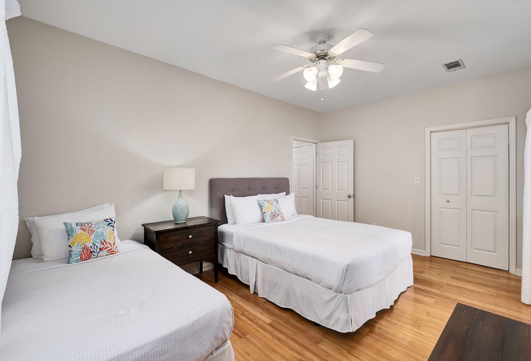 363 Pelican Circle Inlet Beach, FL 32461 - Photo 12 of 80 a bedroom with bed and a chandelier