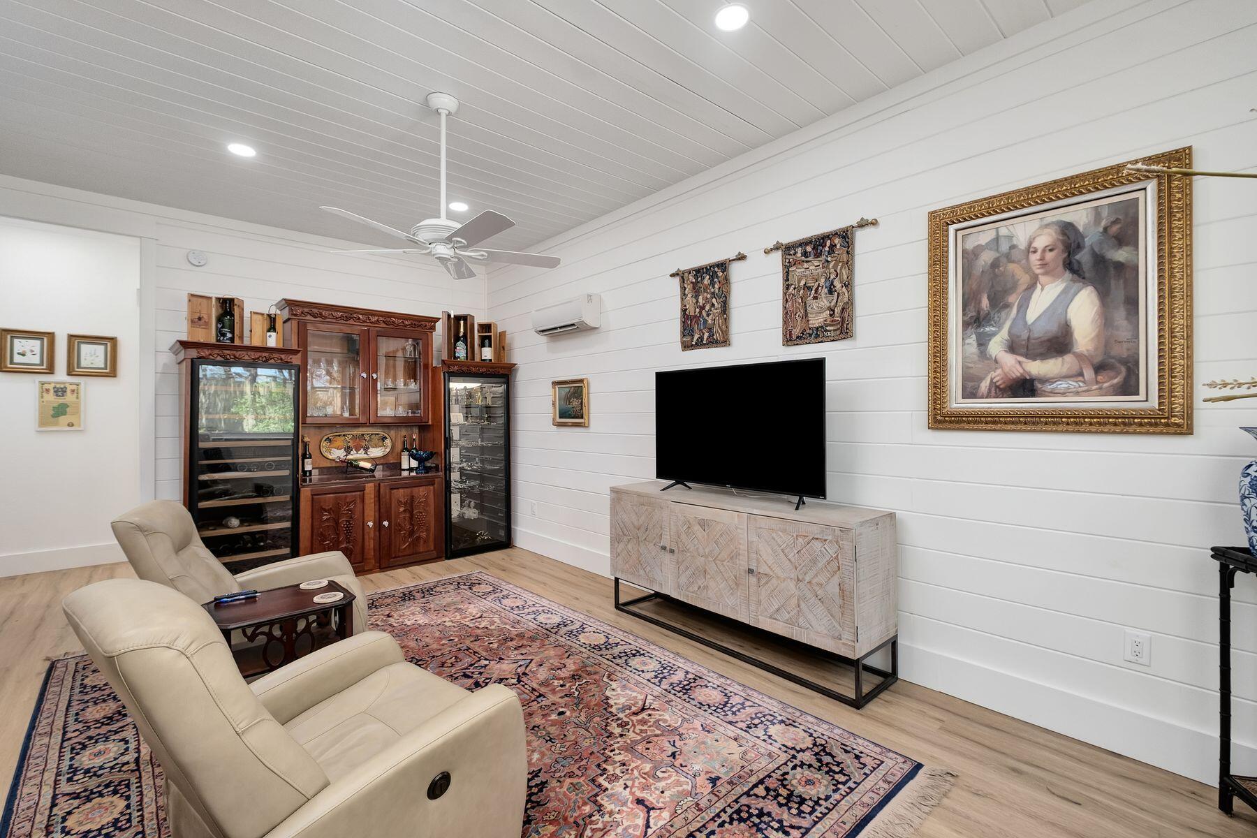 363 Pelican Circle Inlet Beach, FL 32461 - Photo 15 of 80 a living room with furniture and a flat screen tv