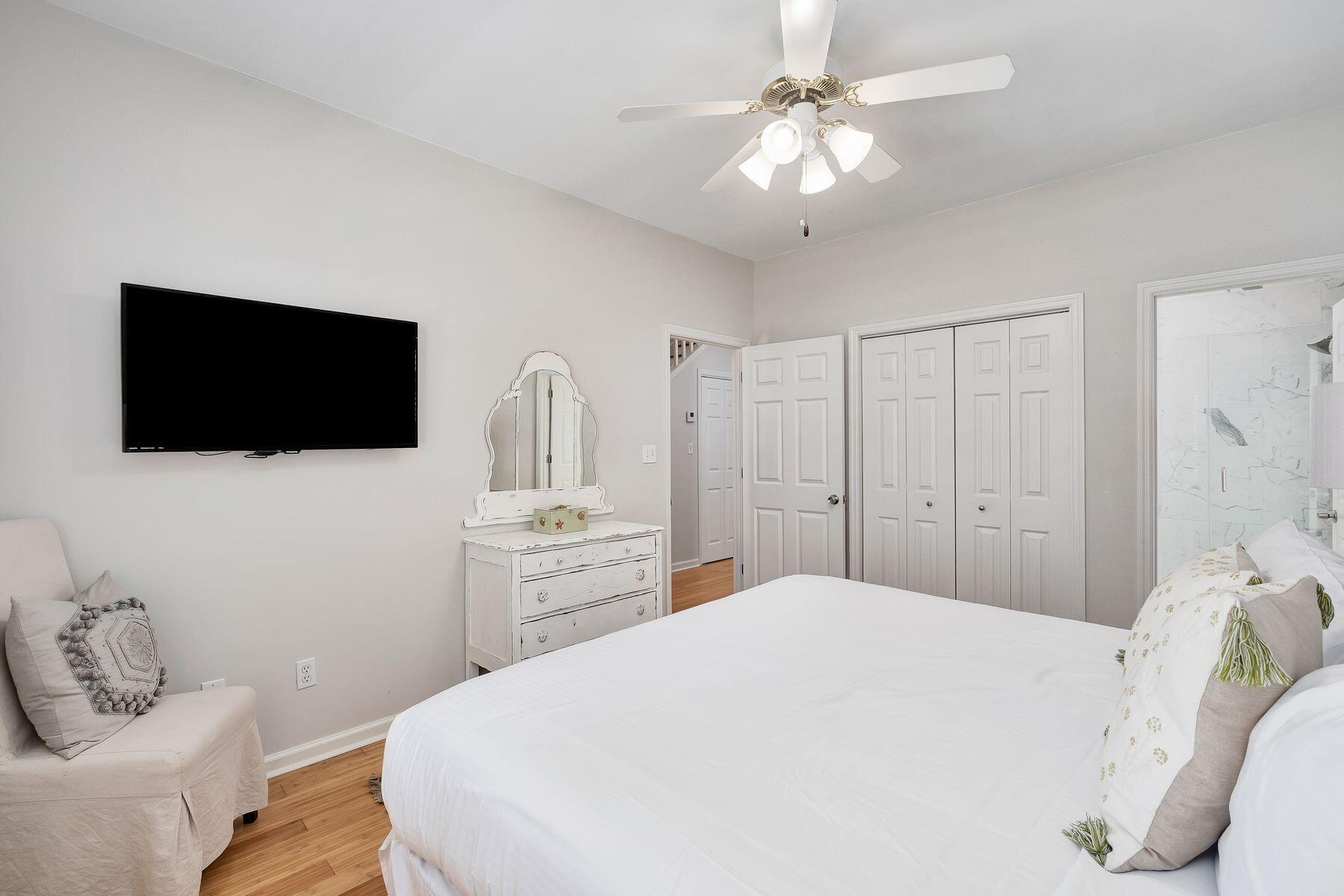 363 Pelican Circle Inlet Beach, FL 32461 - Photo 18 of 80 a bedroom with a bed a window and a flat screen tv