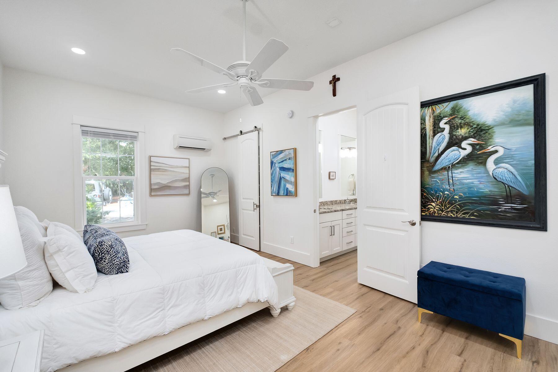 363 Pelican Circle Inlet Beach, FL 32461 - Photo 23 of 80 a bedroom with a bed and a painting on the wall
