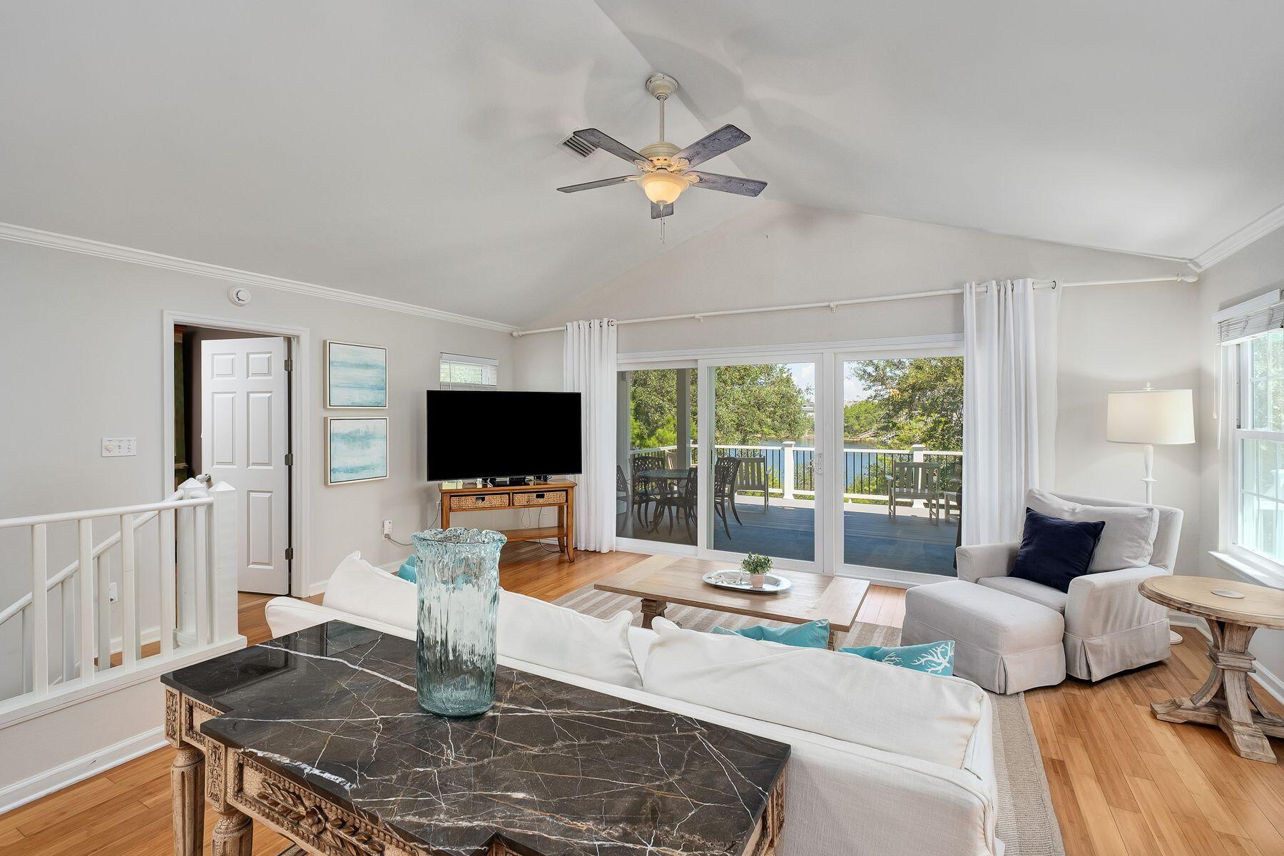 363 Pelican Circle Inlet Beach, FL 32461 - Photo 31 of 80 a living room with furniture and a flat screen tv