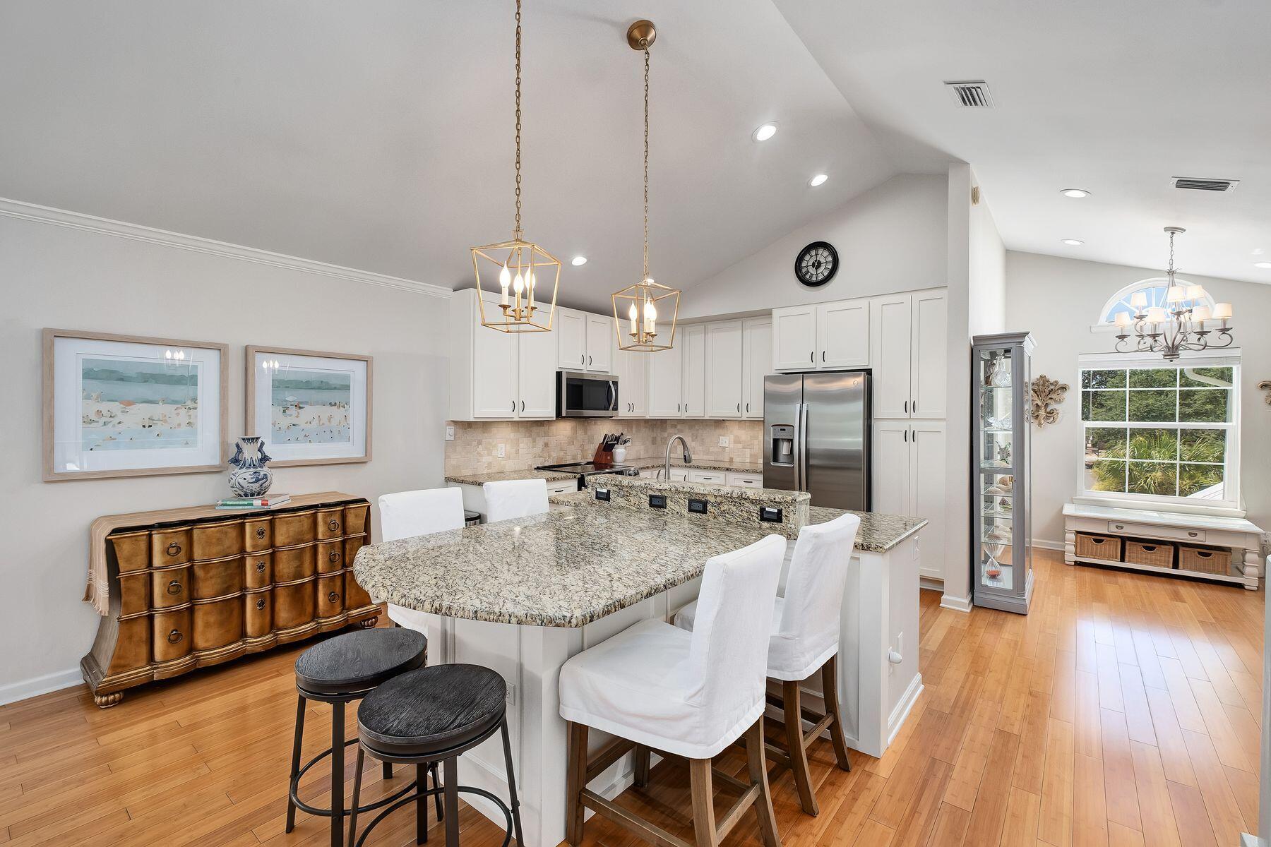 363 Pelican Circle Inlet Beach, FL 32461 - Photo 36 of 80 a large kitchen with a table and chairs