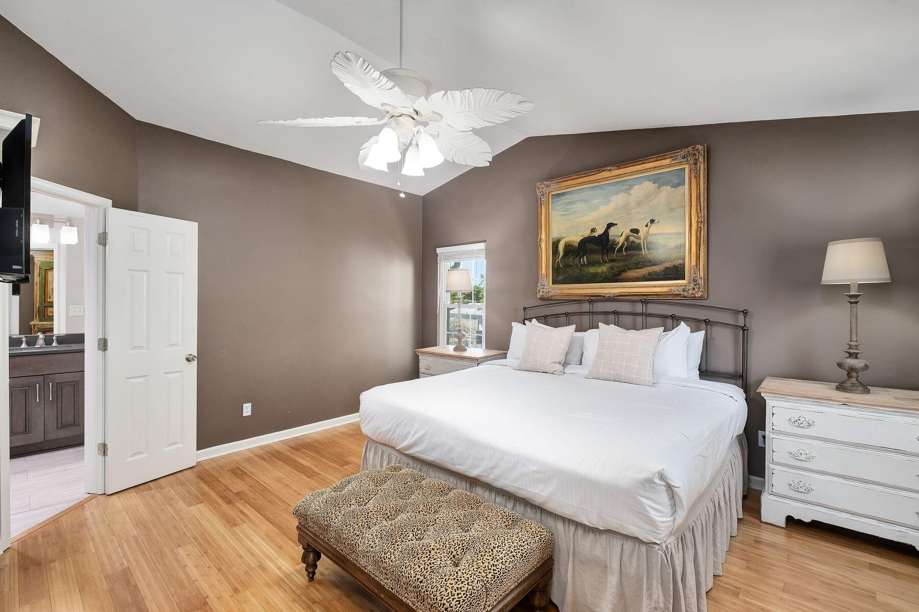 363 Pelican Circle Inlet Beach, FL 32461 - Photo 40 of 80 a bedroom with a bed and a chandelier