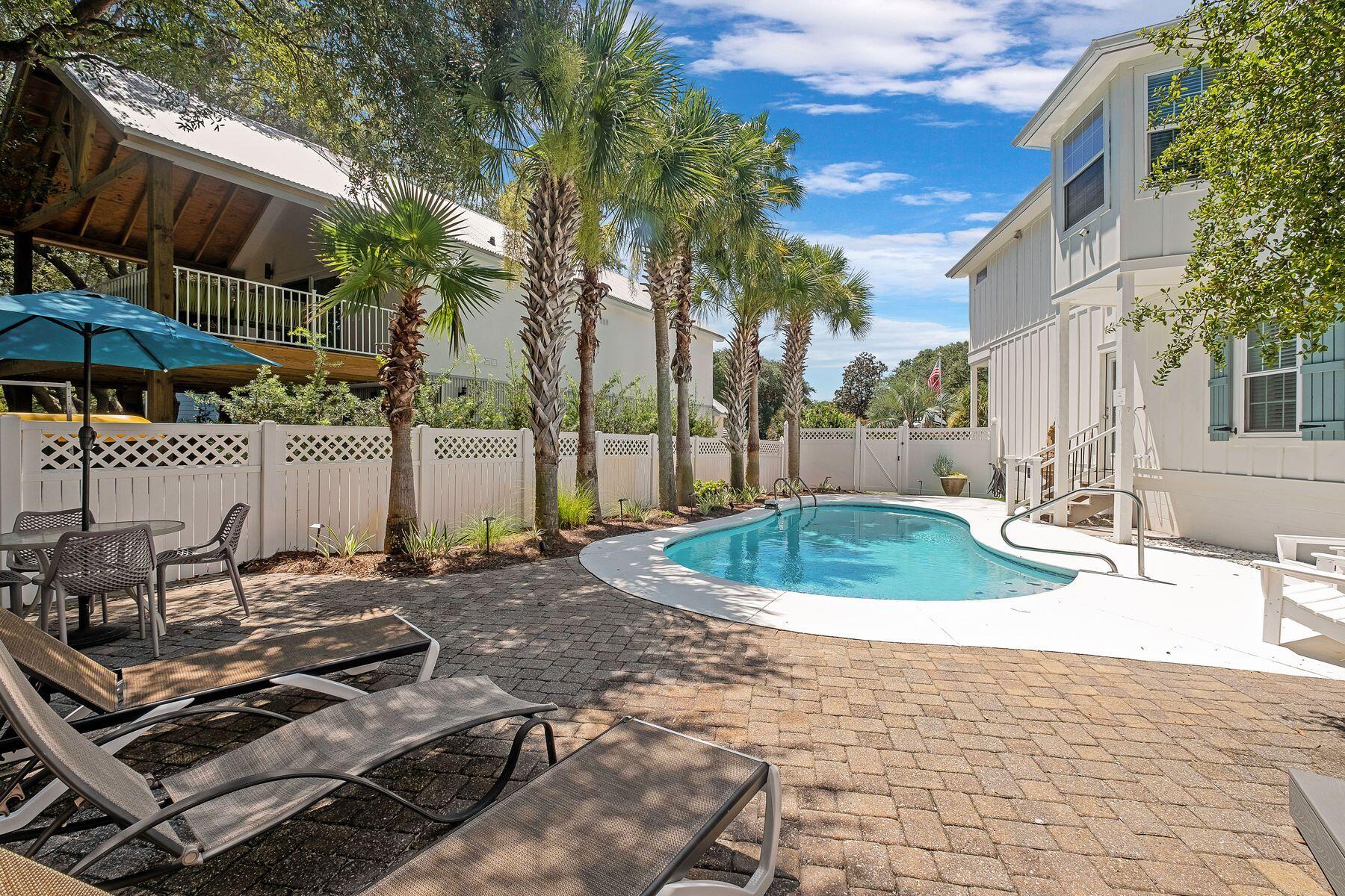 363 Pelican Circle Inlet Beach, FL 32461 - Photo 56 of 80 a view of a backyard with sitting area