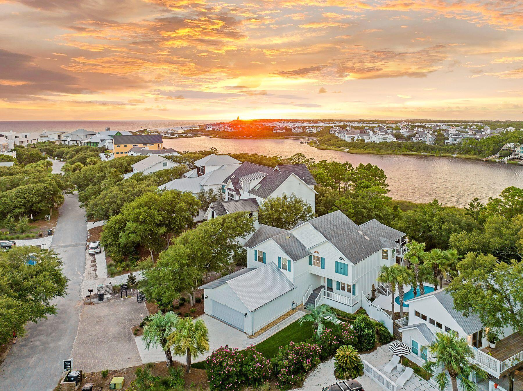 363 Pelican Circle Inlet Beach, FL 32461 - Photo 65 of 80 an aerial view of a city with lots of residential buildings ocean and mountain view in back