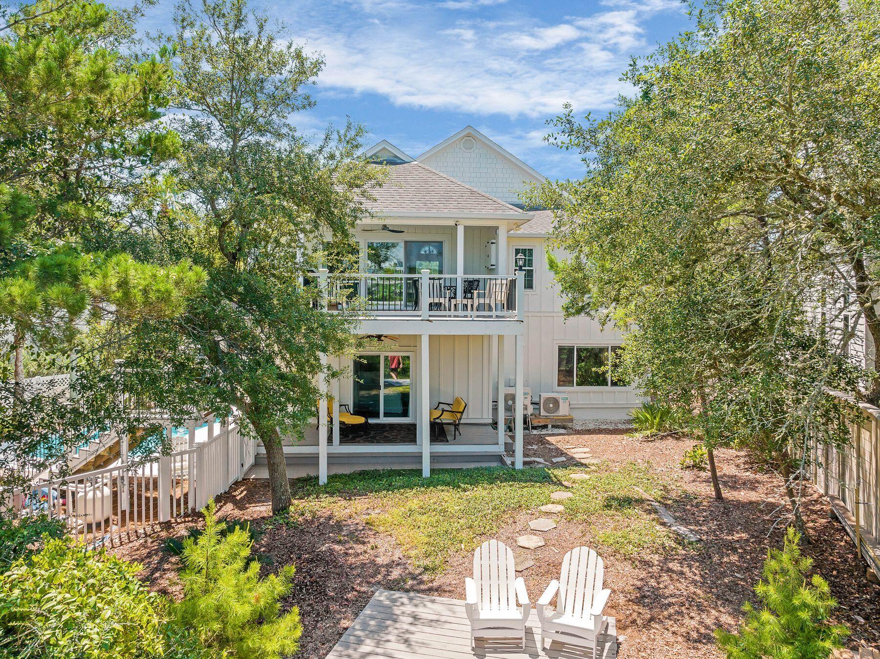 363 Pelican Circle Inlet Beach, FL 32461 - Photo 72 of 80 a front view of a house with a yard