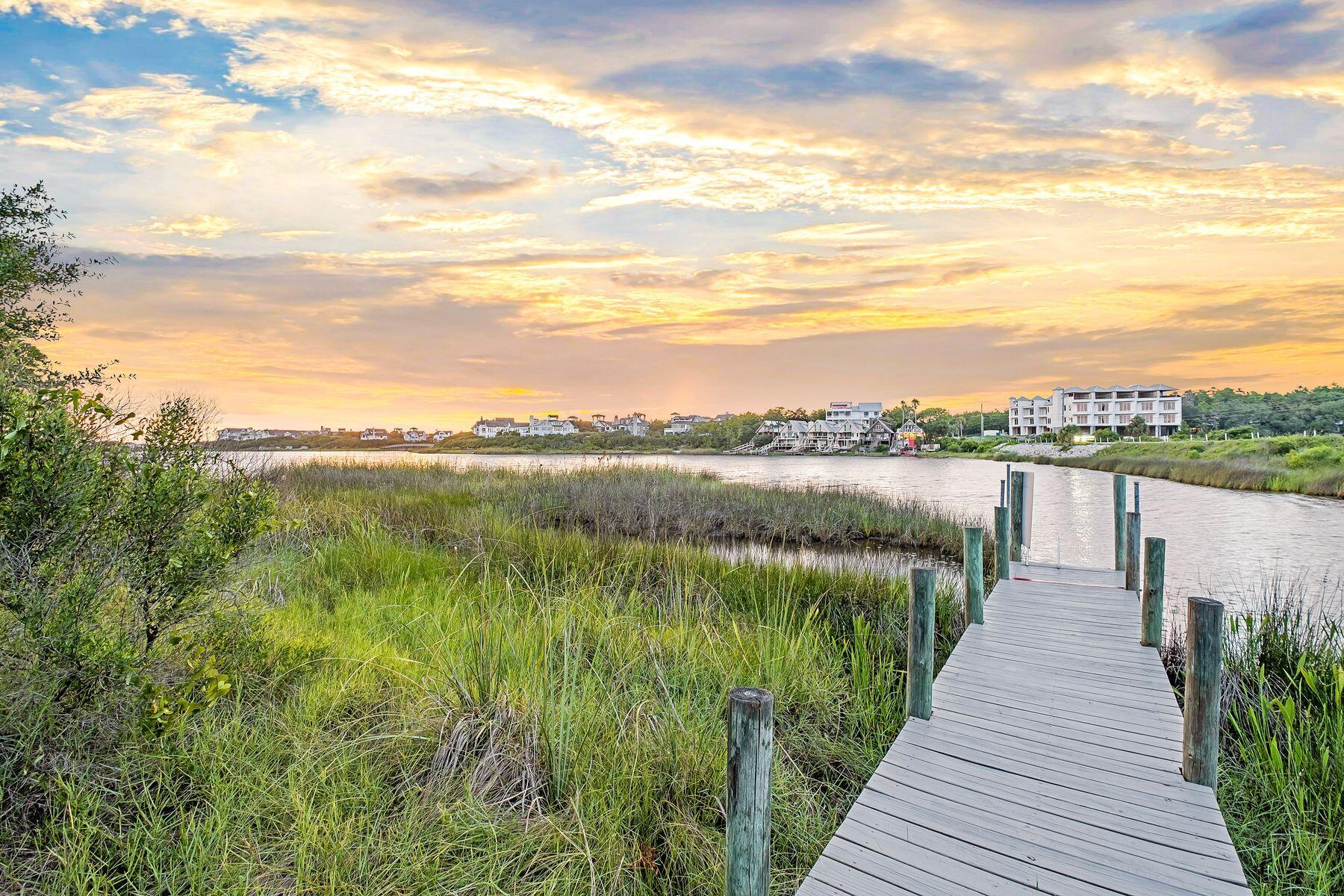 363 Pelican Circle Inlet Beach, FL 32461 - Photo 76 of 80 a view of a lake with a garden