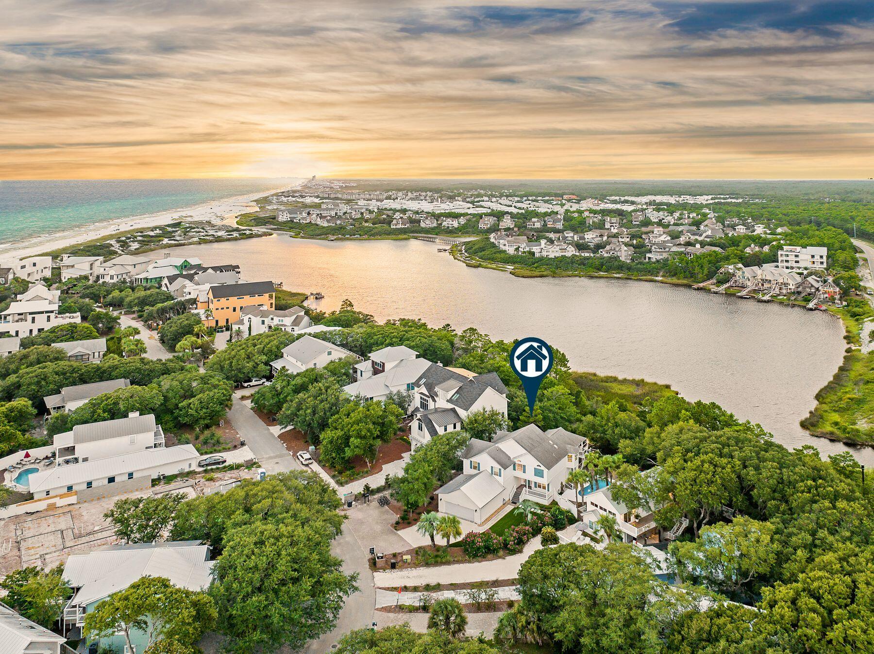 363 Pelican Circle Inlet Beach, FL 32461 - Photo 77 of 80 an aerial view of city and lake with trees all around