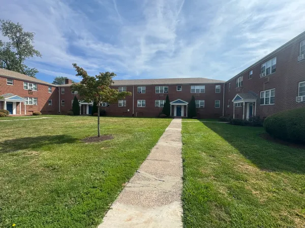 a view of a backyard with green space