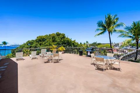 a view of a terrace with chairs