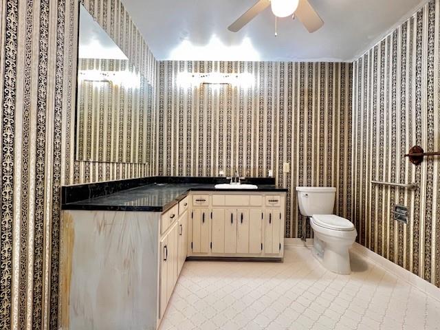 4541 Arcado Road Southwest Lilburn, GA 30047 - Photo 15 of 16 a bathroom with a sink toilet and shower