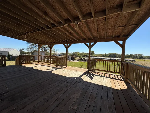 a view of swimming pool with a patio