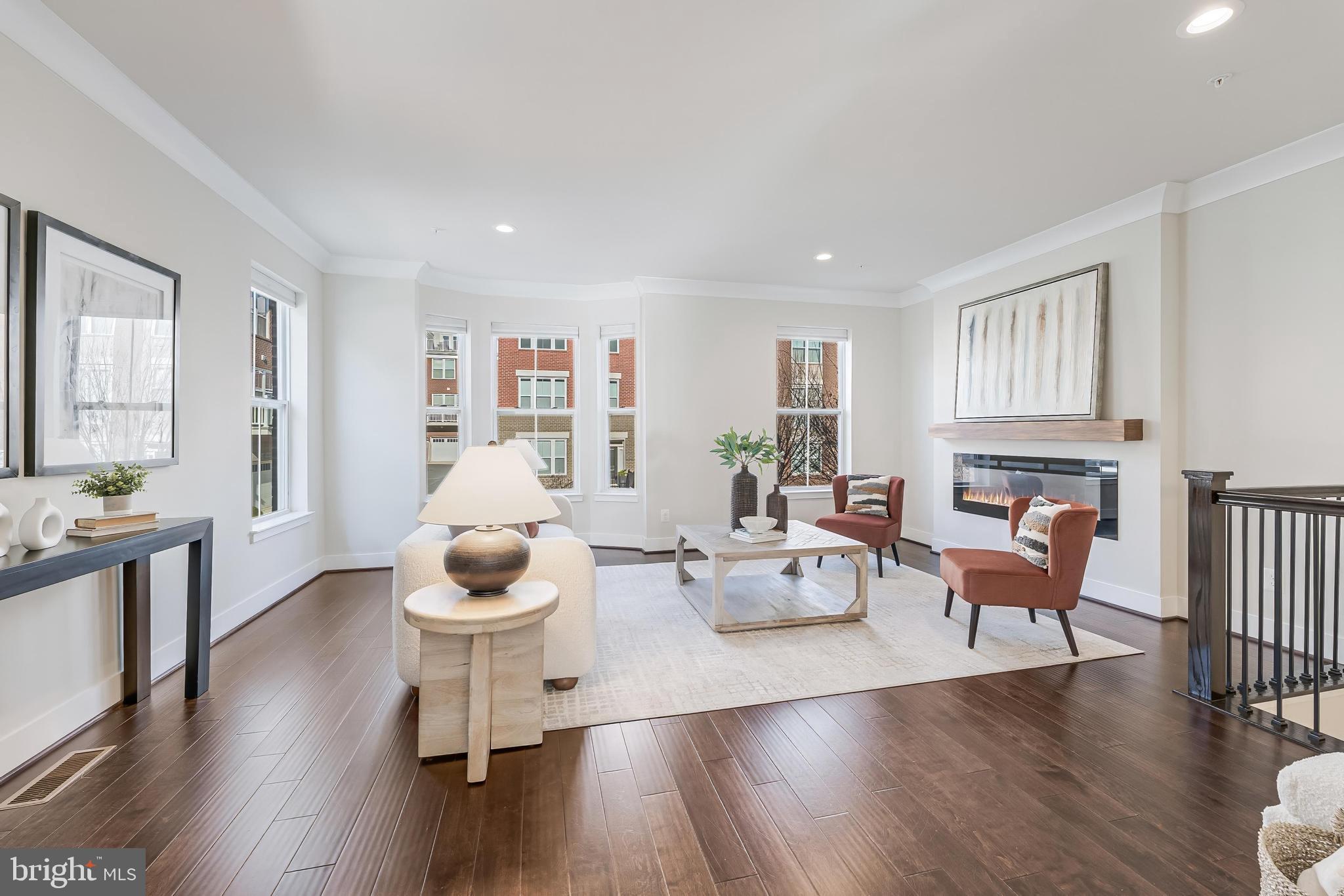 11695 Sunrise Square Place Reston, VA 20191 - Photo 18 of 72 a living room with furniture and wooden floor