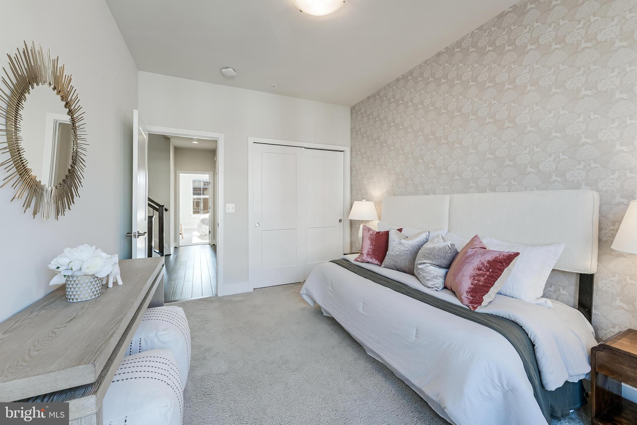 11695 Sunrise Square Place Reston, VA 20191 - Photo 37 of 72 a living room with furniture and a potted plant