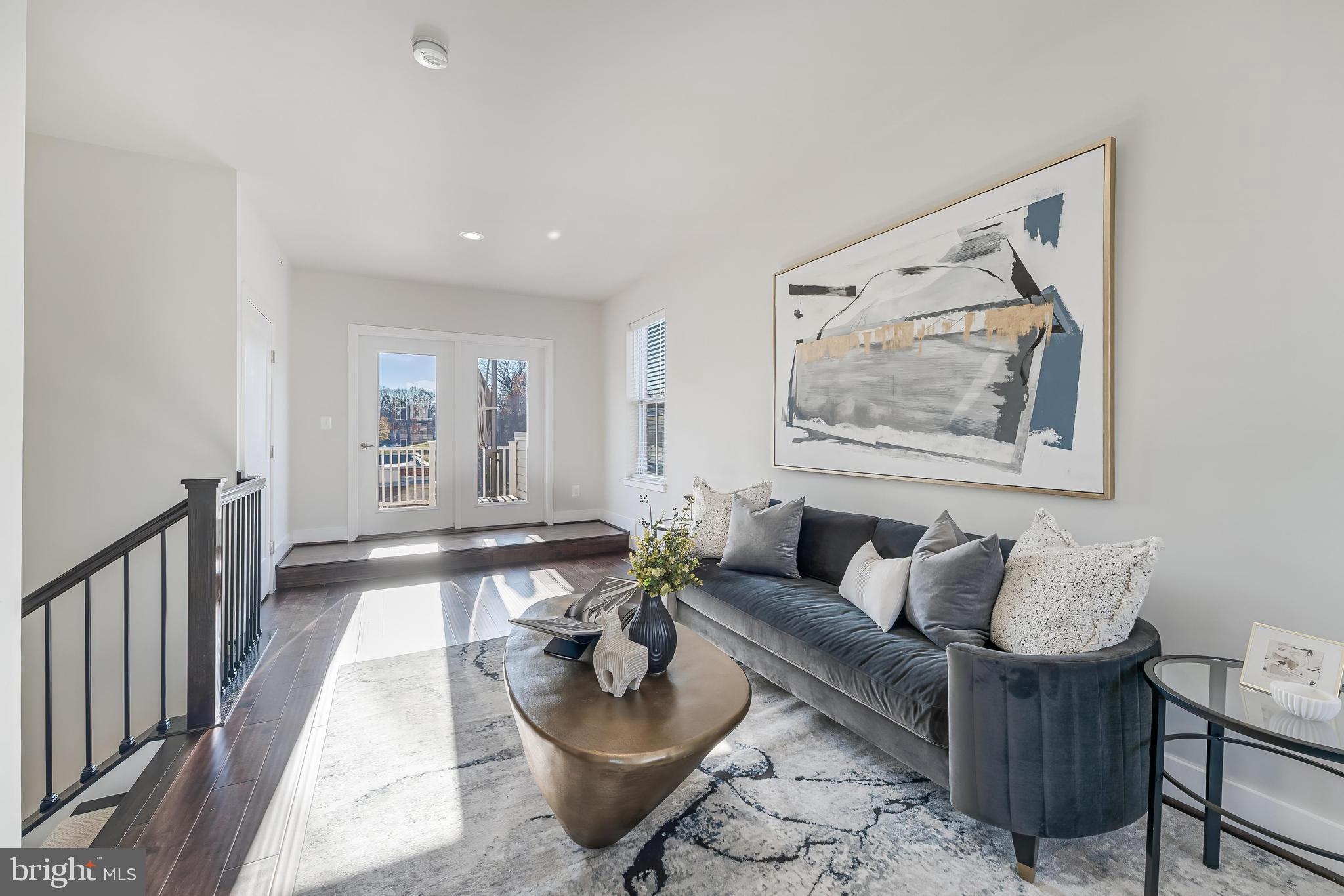 11695 Sunrise Square Place Reston, VA 20191 - Photo 59 of 72 a living room with furniture and a large window