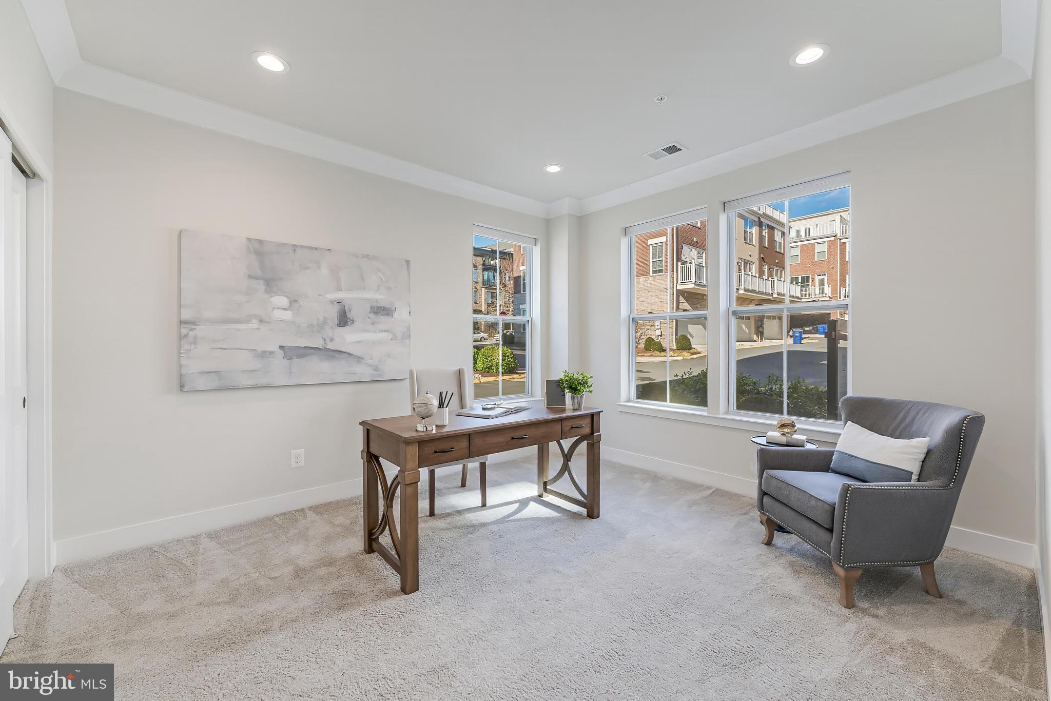 11695 Sunrise Square Place Reston, VA 20191 - Photo 10 of 72 a living room with furniture and a window