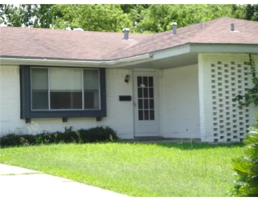 a view of a house with a garden