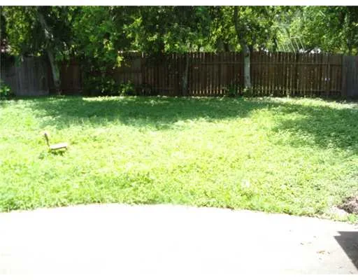 a black and white photo of a house