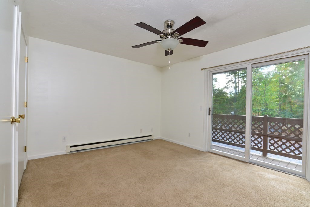 9 May Brook Road, Unit 9 Holland, MA 01521 - Photo 26 of 42 a view of an empty room with a window