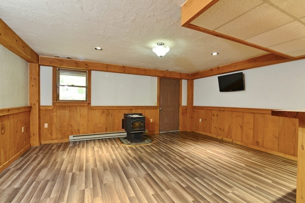 9 May Brook Road, Unit 9 Holland, MA 01521 - Photo 31 of 42 a view of empty room with wooden floor