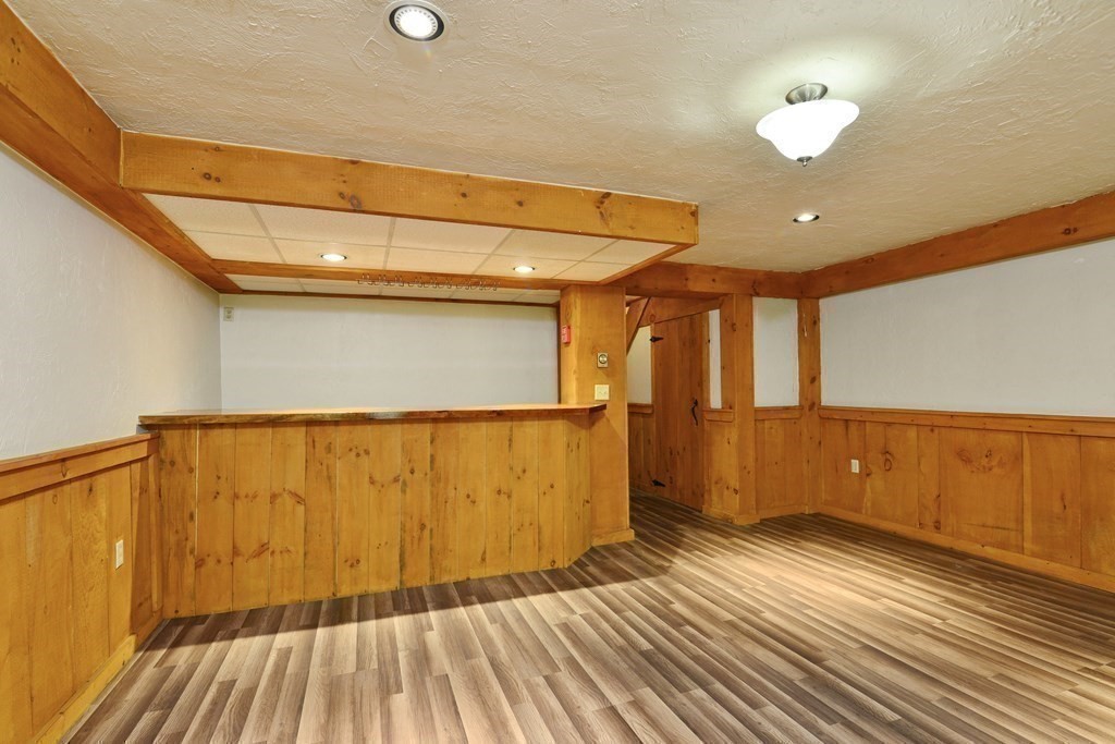 9 May Brook Road, Unit 9 Holland, MA 01521 - Photo 32 of 42 a view of a room with wooden floor