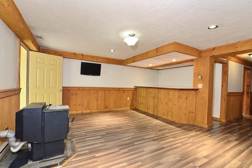 9 May Brook Road, Unit 9 Holland, MA 01521 - Photo 33 of 42 a view of room with window and wooden floor