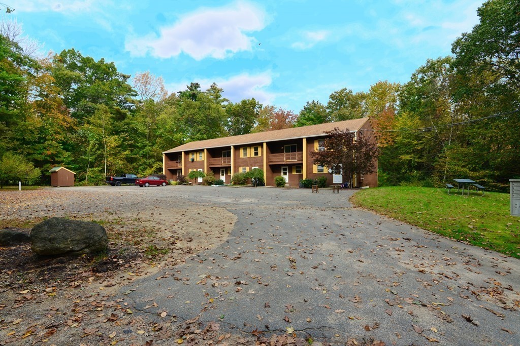 9 May Brook Road, Unit 9 Holland, MA 01521 - Photo 5 of 42 a view of house with a yard