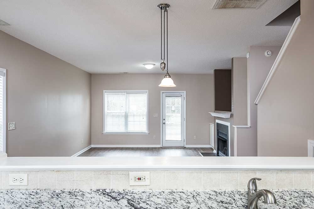 2044 Persimmon Ridge Drive Raleigh, NC 27604 - Photo 5 of 30 Never feel excluded while prepping dinner or on clean up duty! Kitchen