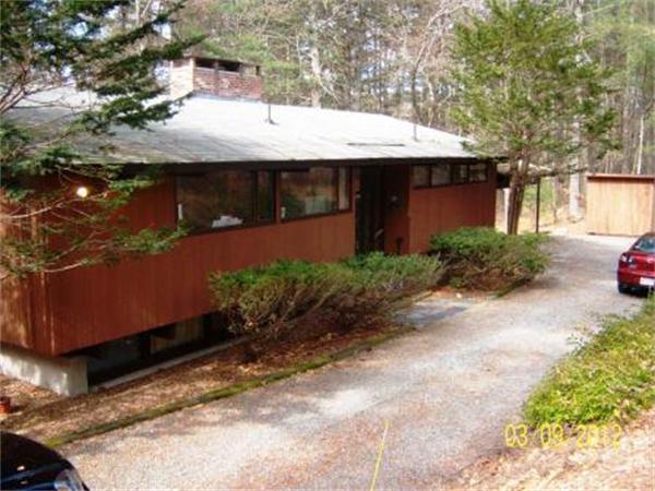149 Judy Farm Road Carlisle, MA 01741 - Photo 1 of 10 a view of a house with a patio