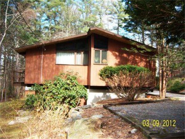 149 Judy Farm Road Carlisle, MA 01741 - Photo 2 of 10 a backyard of a house with lots of green space