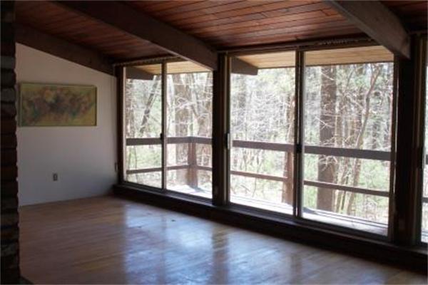 149 Judy Farm Road Carlisle, MA 01741 - Photo 8 of 10 a view of an empty room with a large window