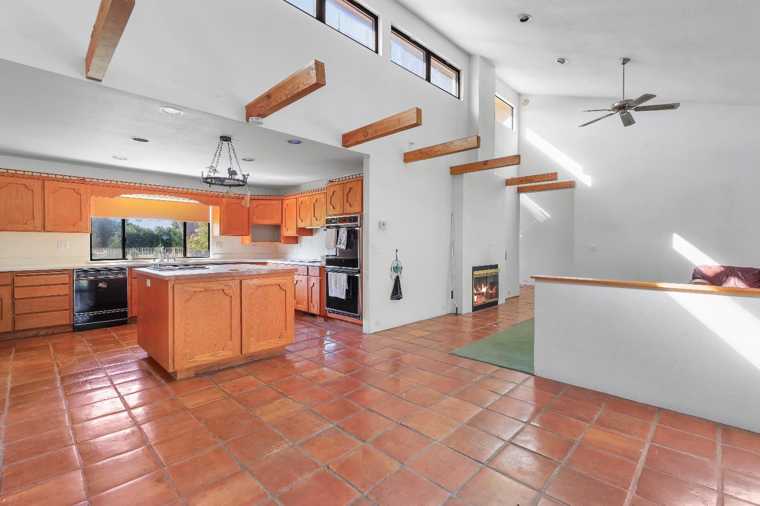 9537 Alta Mesa Road Wilton, CA 95693 - Photo 20 of 33 a view of a kitchen with a sink and cabinets