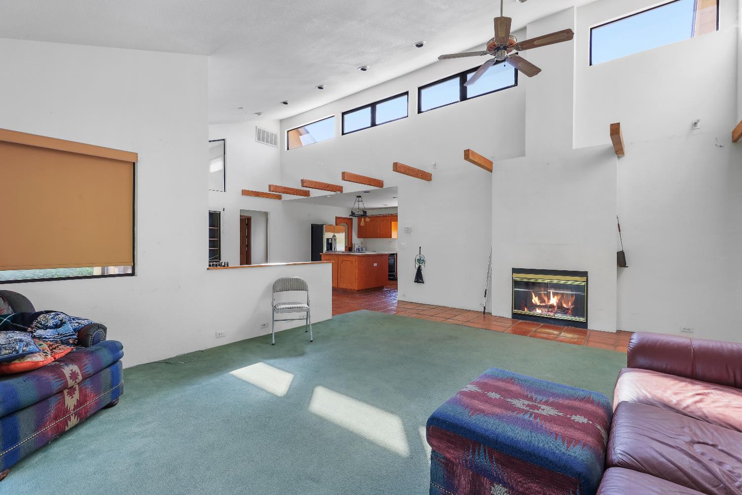 9537 Alta Mesa Road Wilton, CA 95693 - Photo 23 of 33 a living room with furniture and a fireplace