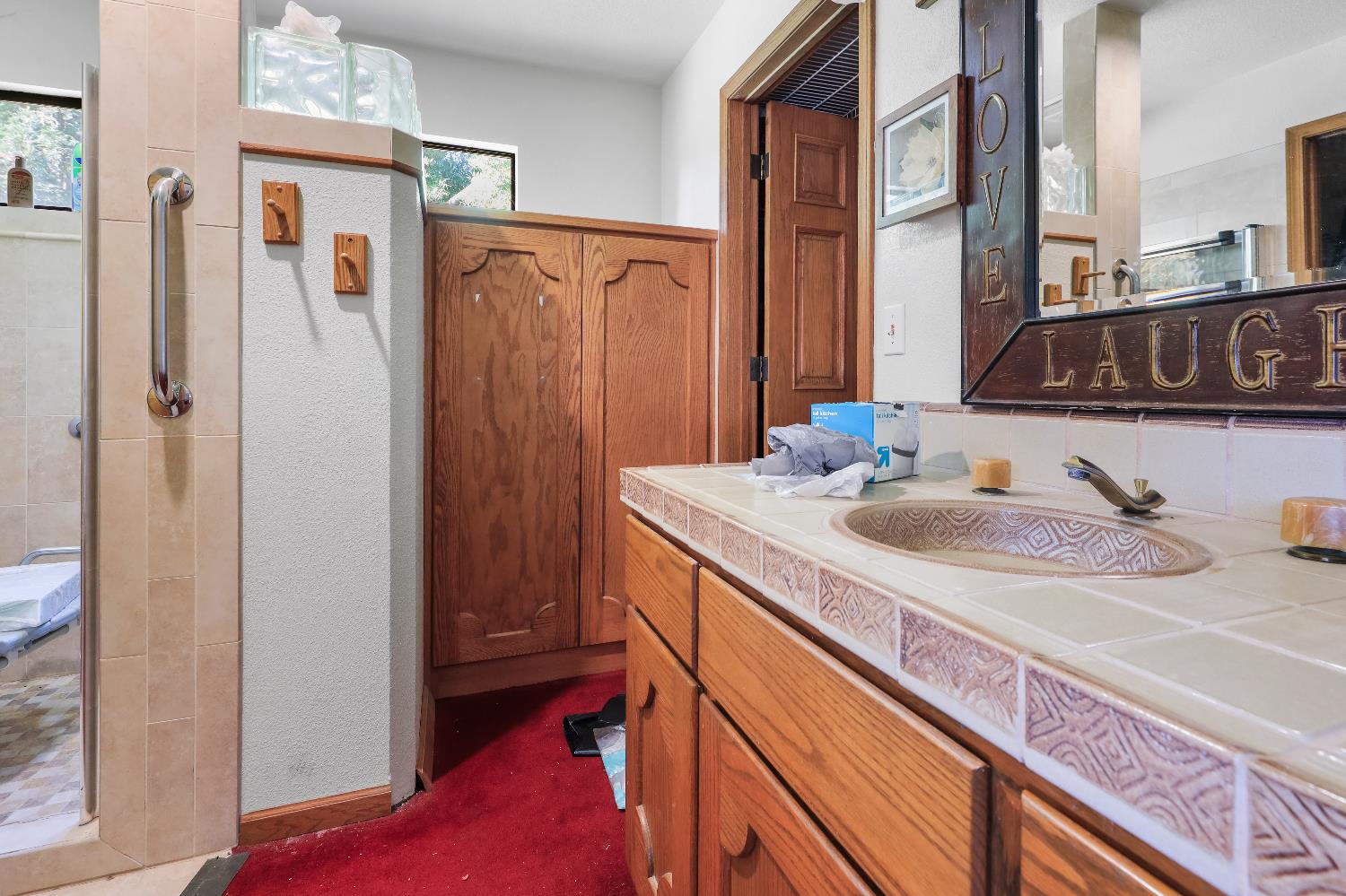 9537 Alta Mesa Road Wilton, CA 95693 - Photo 28 of 33 a bathroom with a sink and a mirror