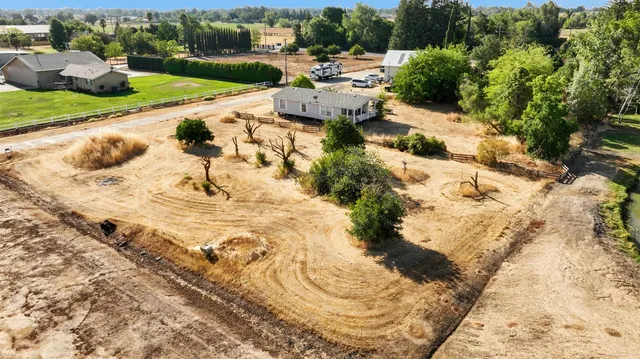 a view of a lake with a yard