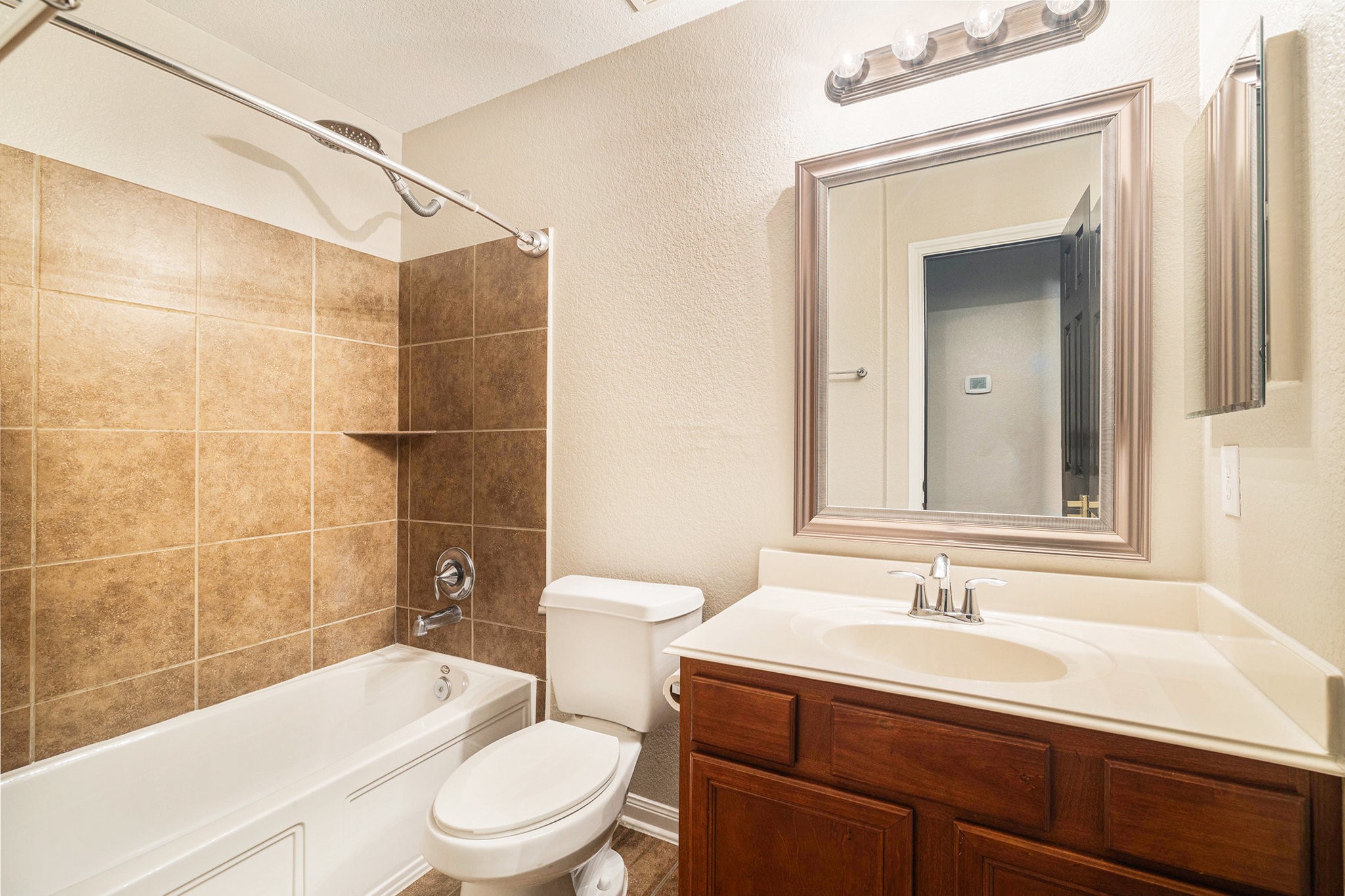 139 North Hawkhurst Circle Magnolia, TX 77354 - Photo 15 of 26 a bathroom with a sink a toilet and shower