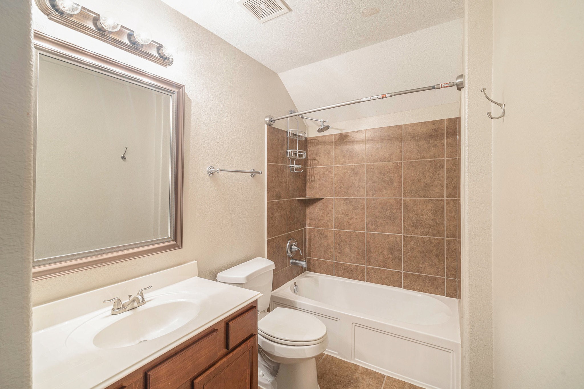139 North Hawkhurst Circle Magnolia, TX 77354 - Photo 19 of 26 a bathroom with a sink a toilet and shower