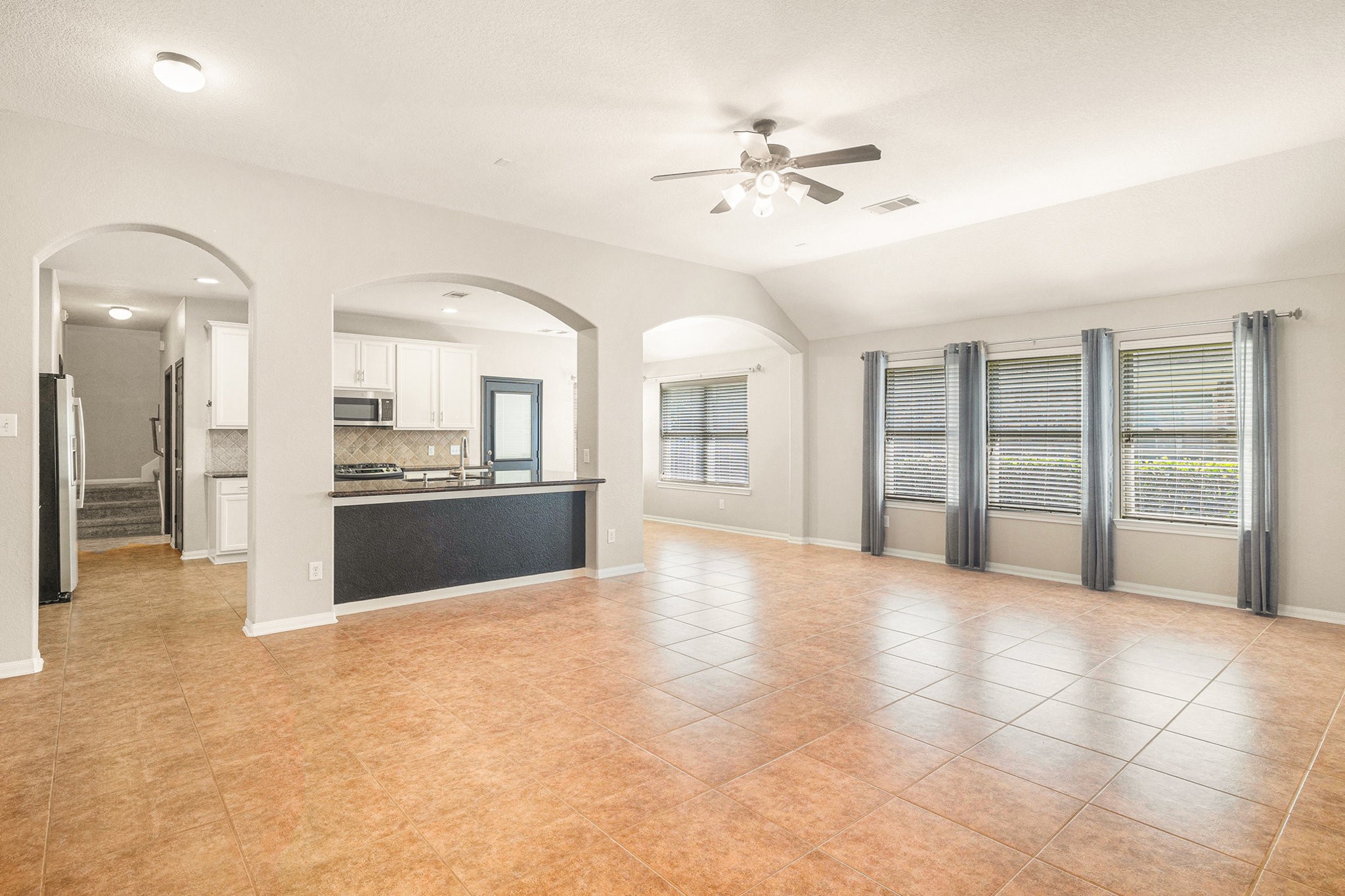 139 North Hawkhurst Circle Magnolia, TX 77354 - Photo 2 of 26 a view of an empty room with a kitchen