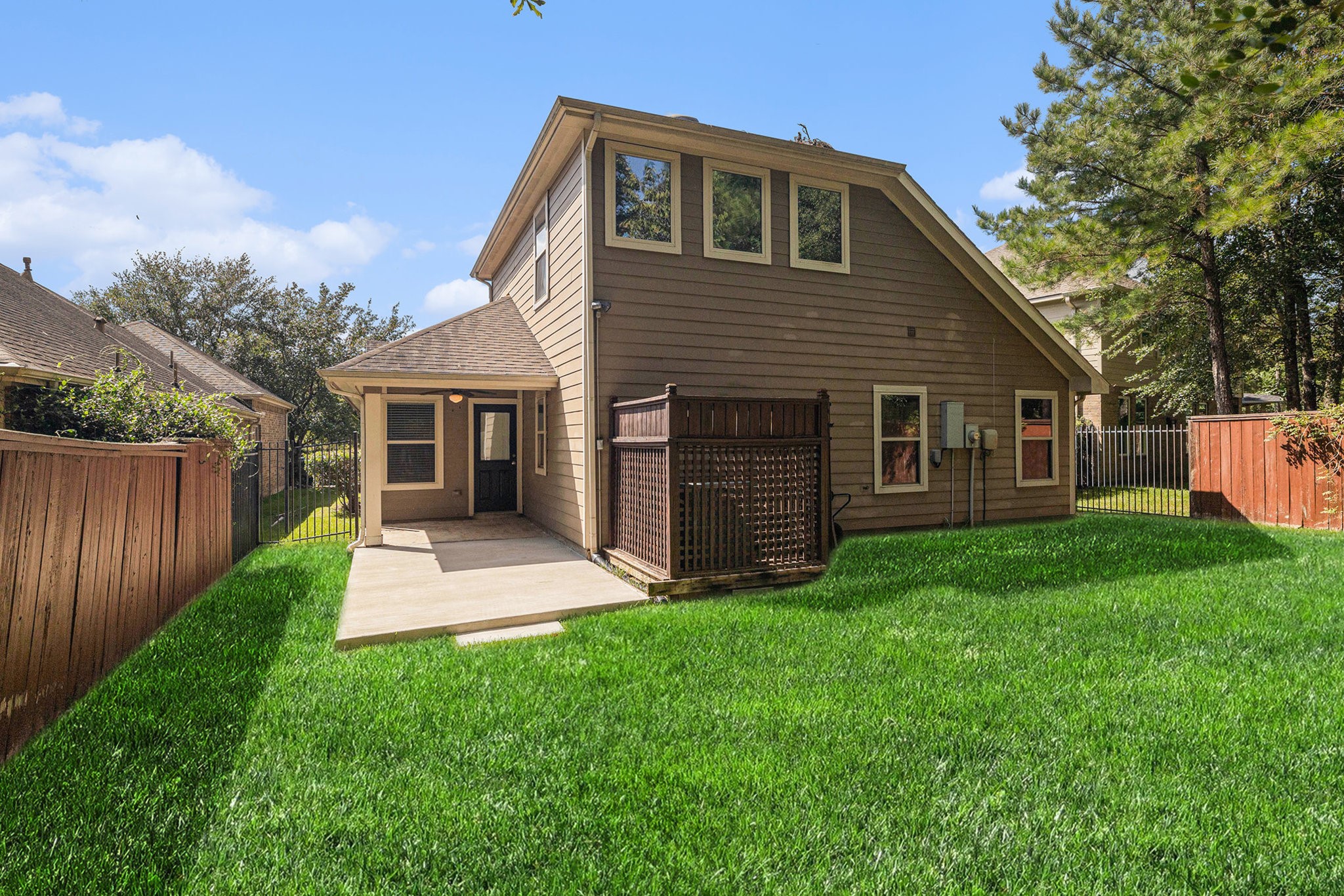 139 North Hawkhurst Circle Magnolia, TX 77354 - Photo 21 of 26 a front view of house with yard and green space