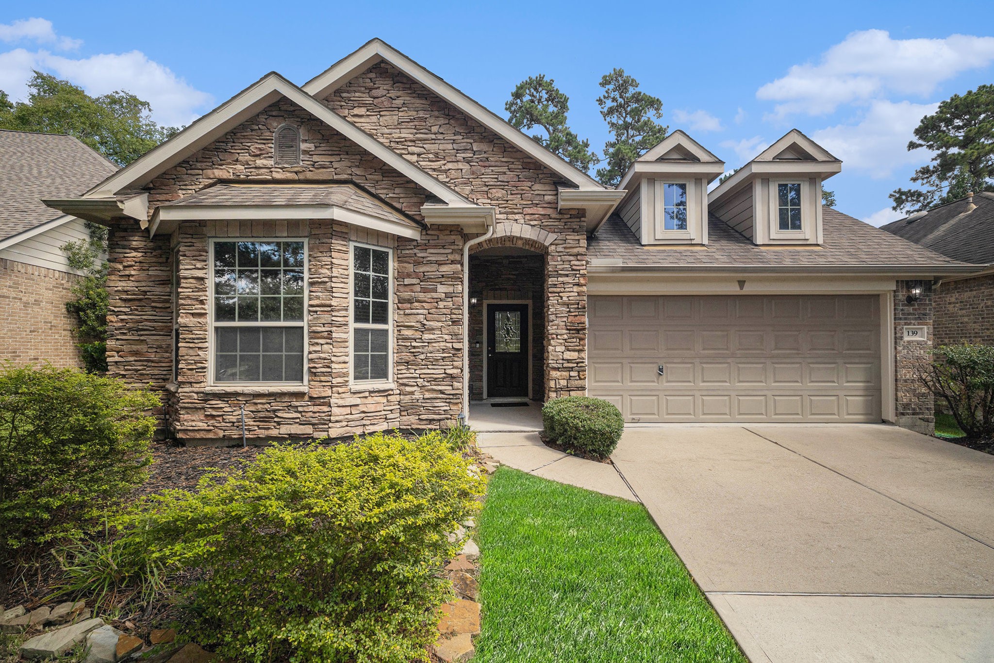 139 North Hawkhurst Circle Magnolia, TX 77354 - Photo 26 of 26 front view of a house with a yard