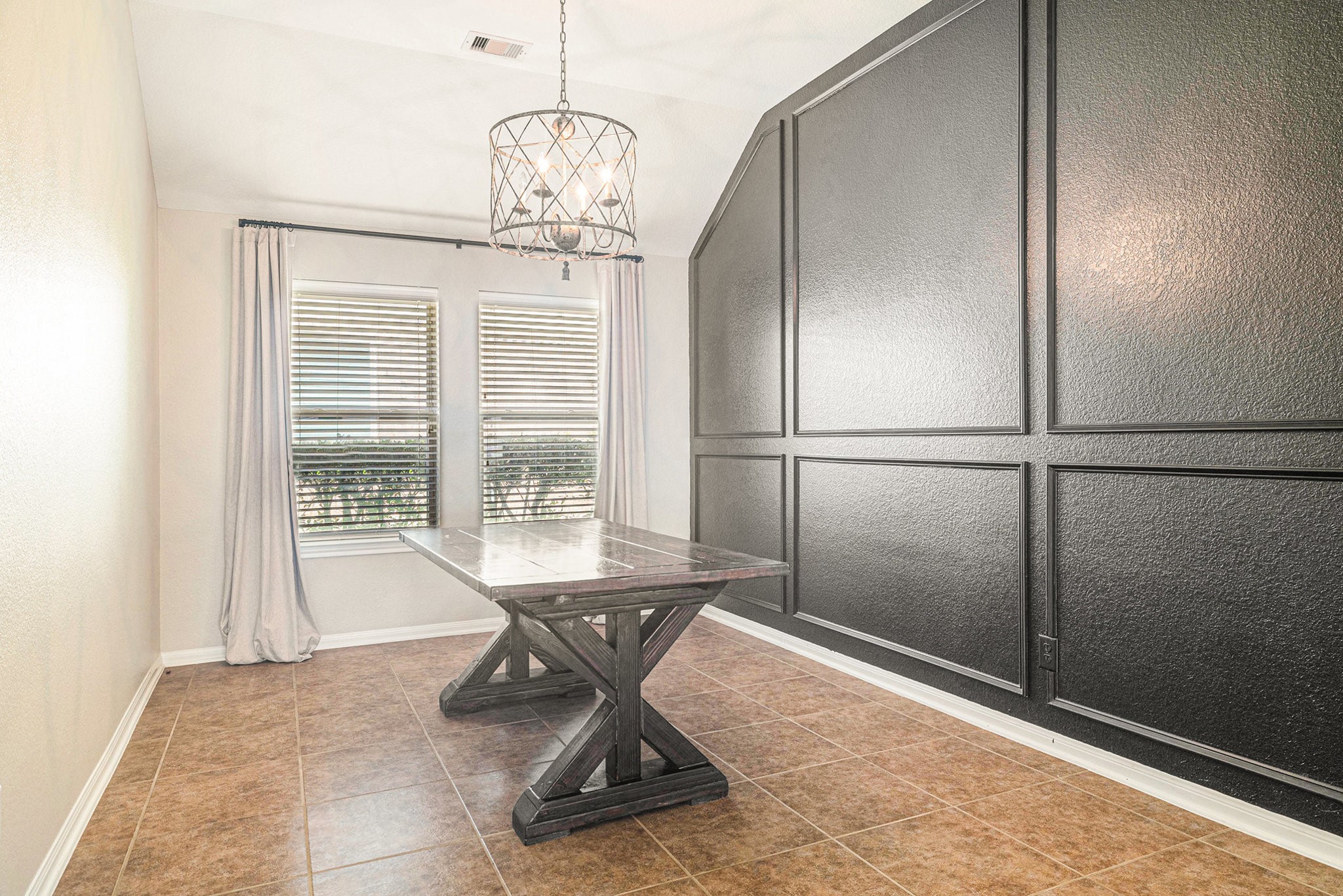 139 North Hawkhurst Circle Magnolia, TX 77354 - Photo 8 of 26 a view of a room with a chandelier and wooden floor