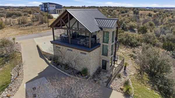 a view of a house with a roof deck