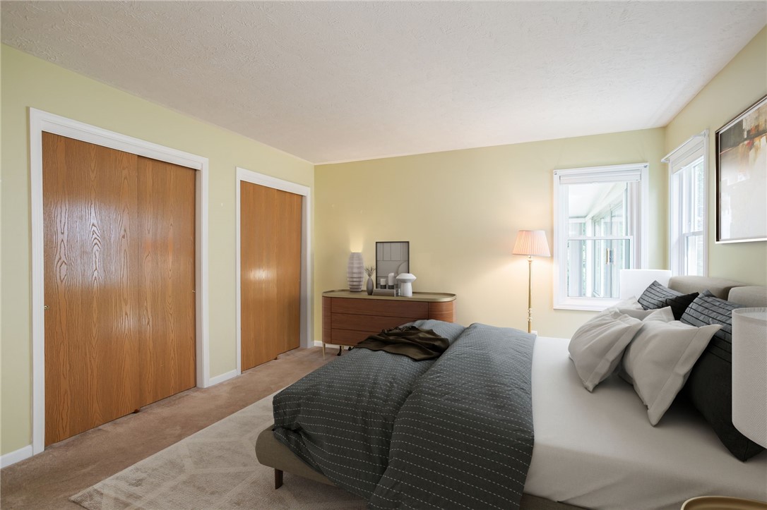 204 Webster Commons Boulevard Webster, NY 14580 - Photo 14 of 50 Primary Bedroom with 2 double closets