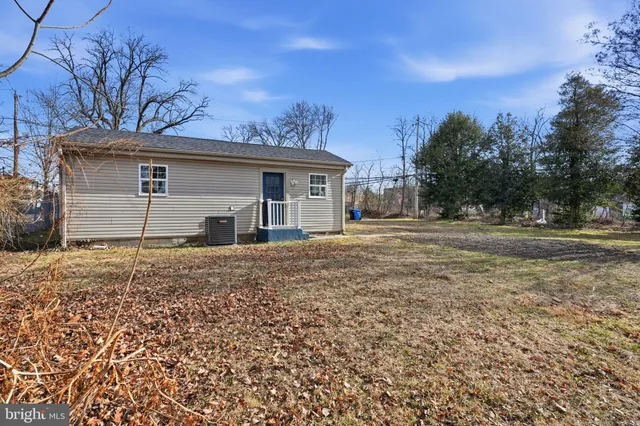 a house view with a backyard space